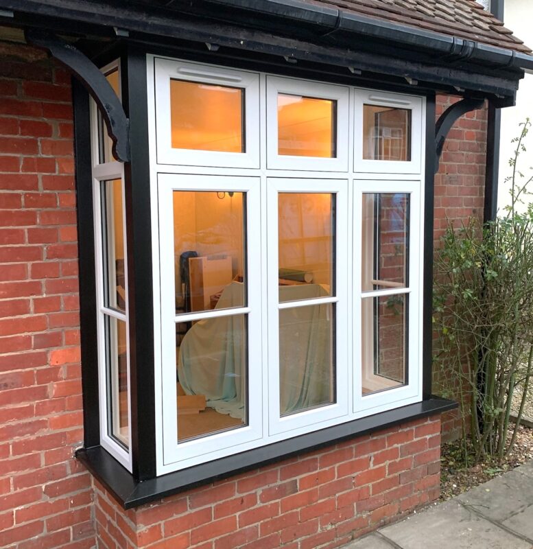White UPVC bay window.
