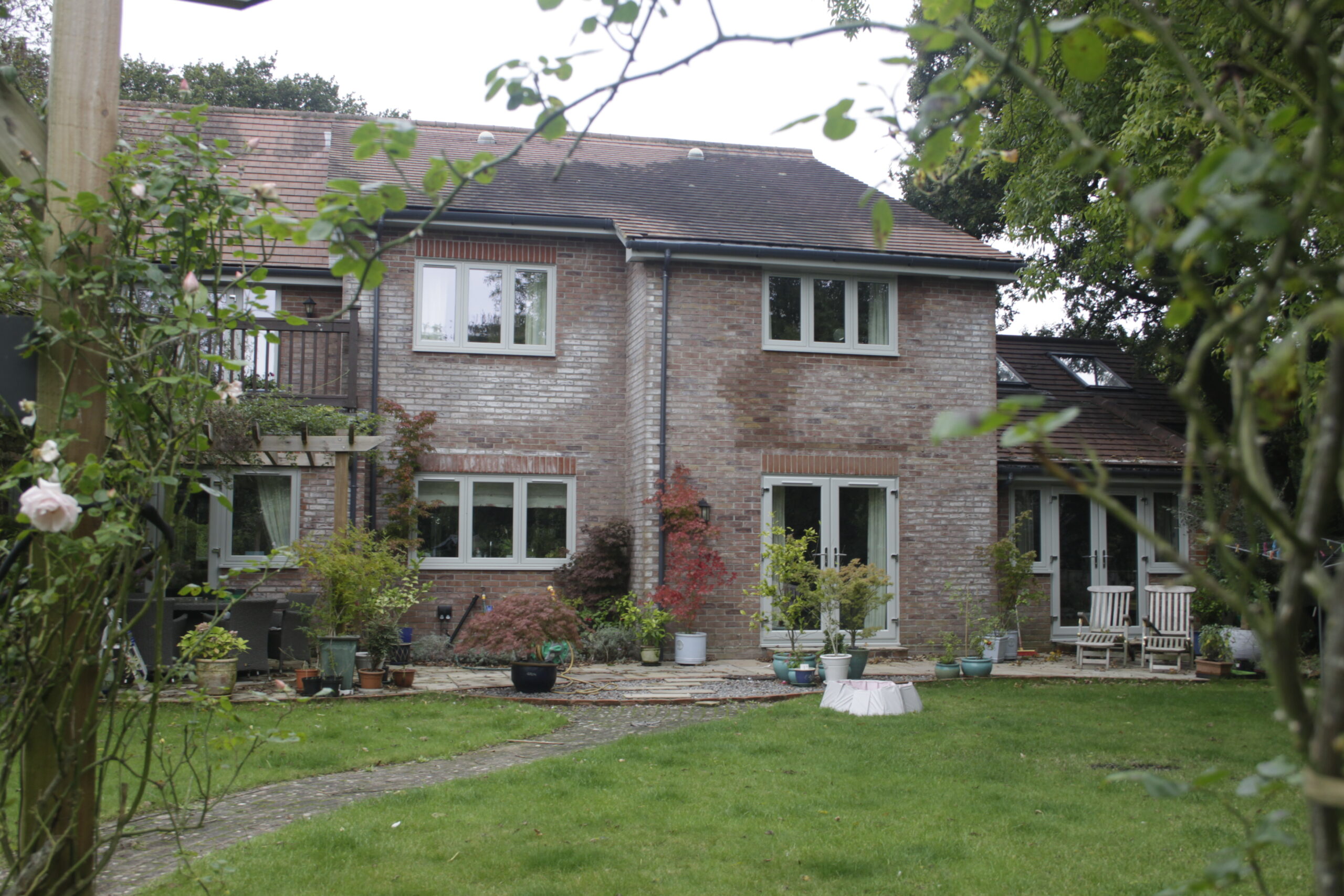 Back of home, with uPVC window in grey